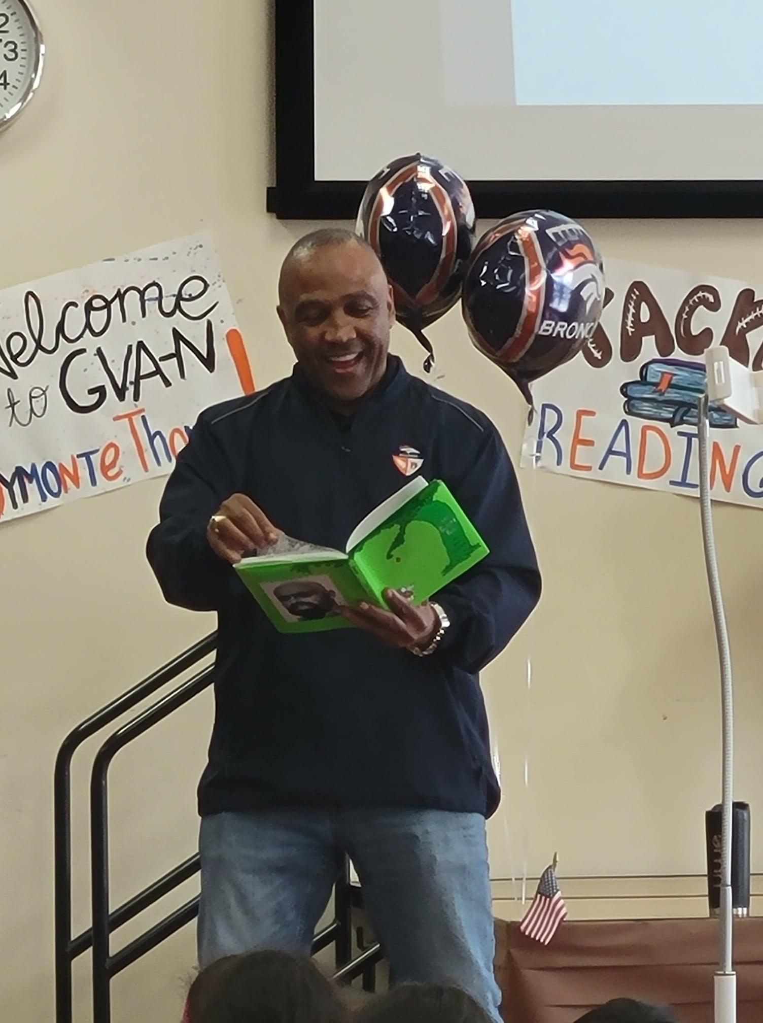 Mark Jackson reading the Giving Tree to students